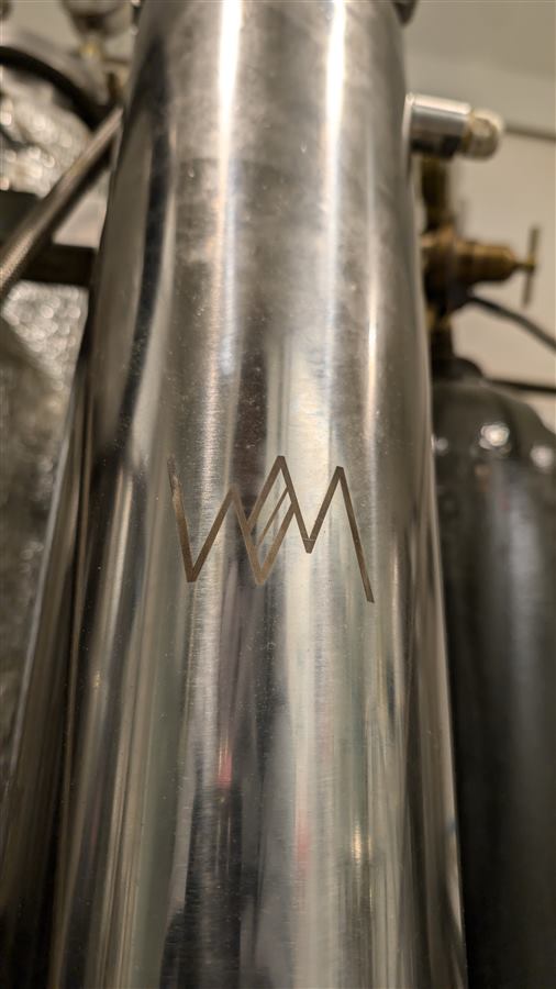 WM monogram frosted into a column